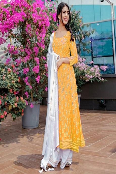 Eye Watering Yellow Color Embroidery Work Suit Designs