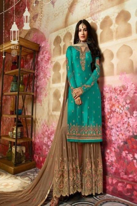 Beautiful Shining Firozi Color Heavy Embroidery Work Salwar Suits