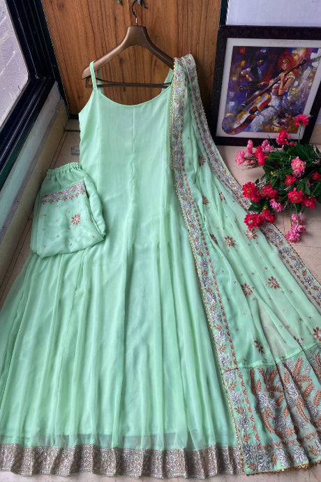 Poly Silk light green color Heavy Embroidered gown for girls