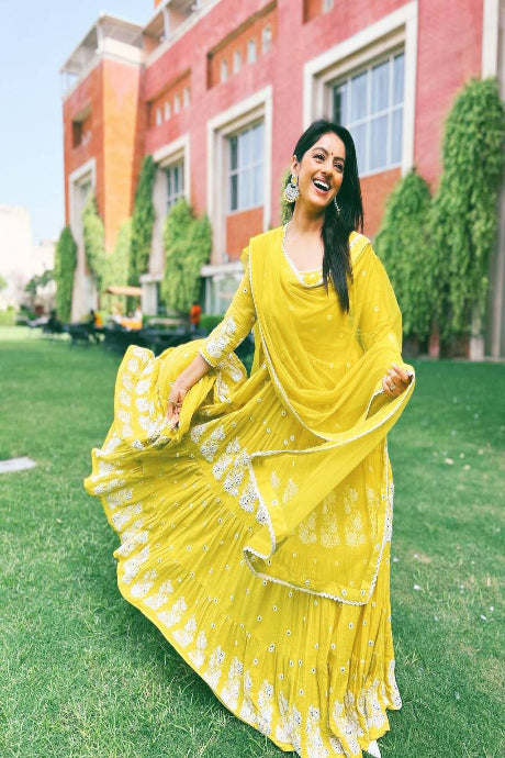 Art Silk yellow color Silk Heavy Box Pattern Round gown for girls