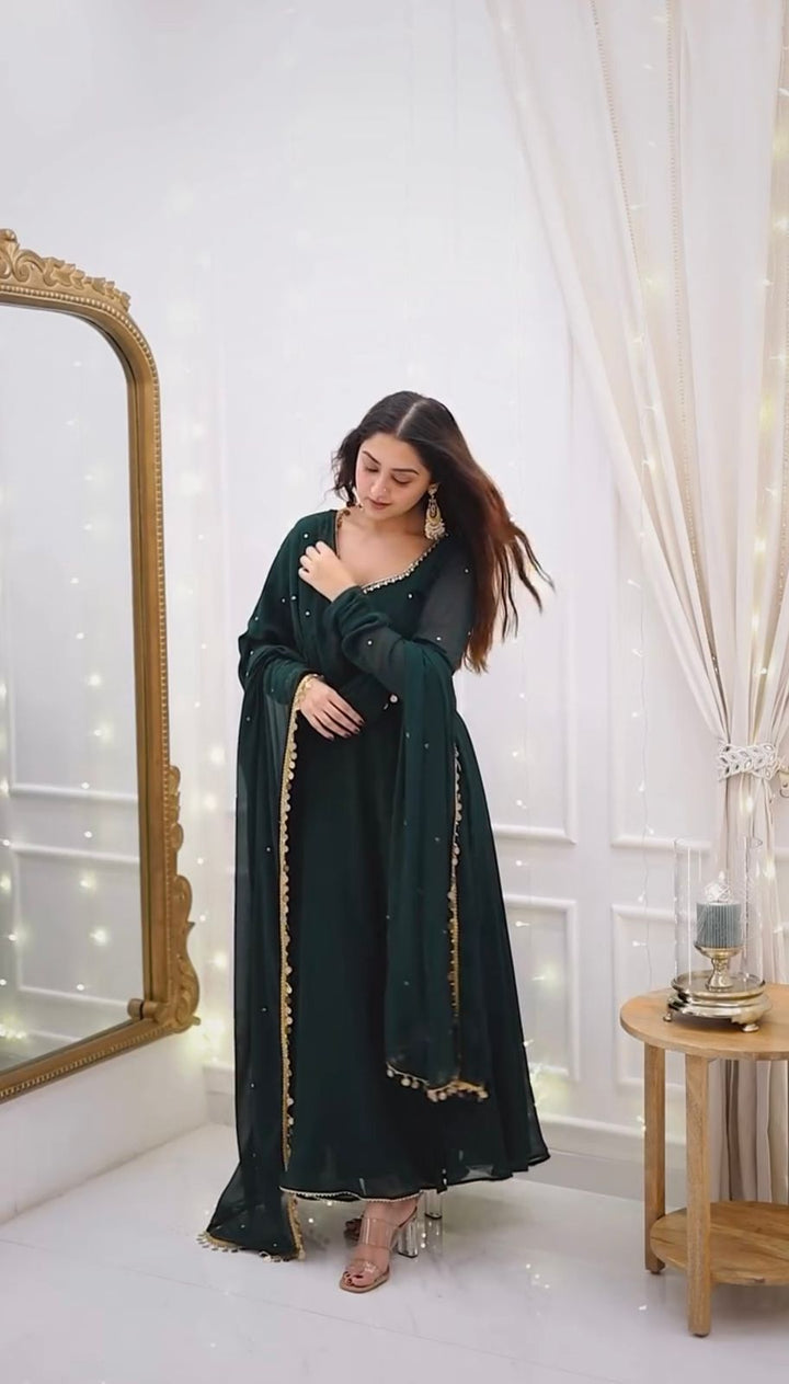 Attractive green Color Heavy Reyon Prints Gown