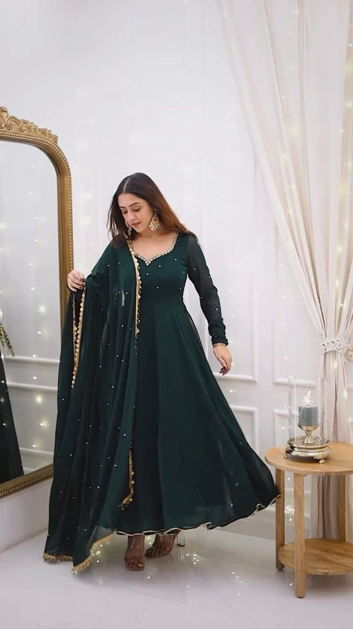 Attractive green Color Heavy Reyon Prints Gown