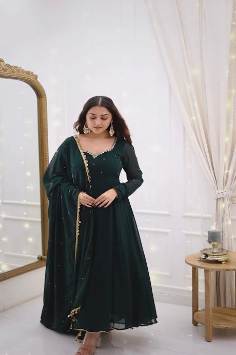 Attractive green Color Heavy Reyon Prints Gown