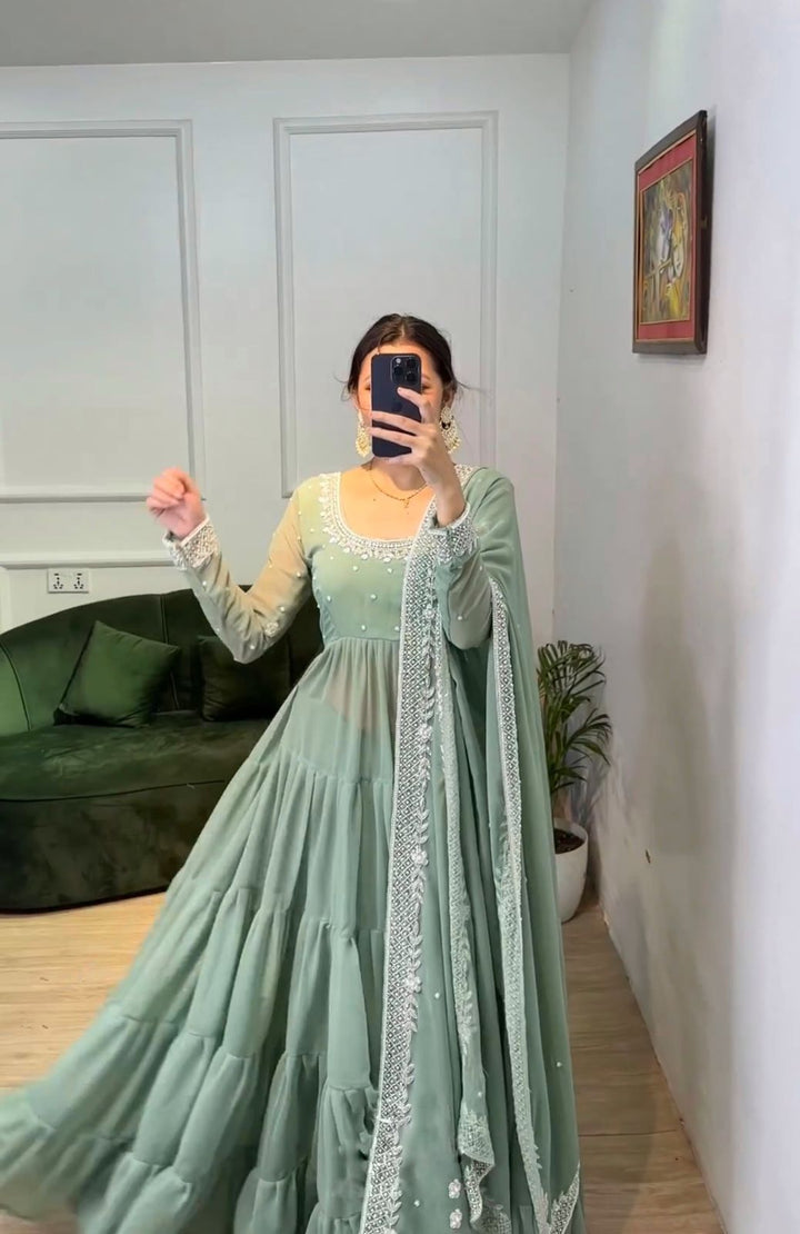 Pure Designer SequvanceEmbroidery Work Gown For Girls Party Wear