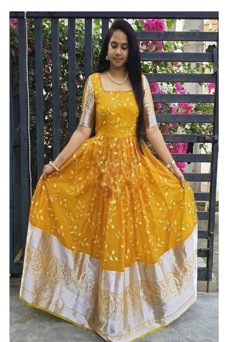 Hand Work yellow Color Silk gown for girls
